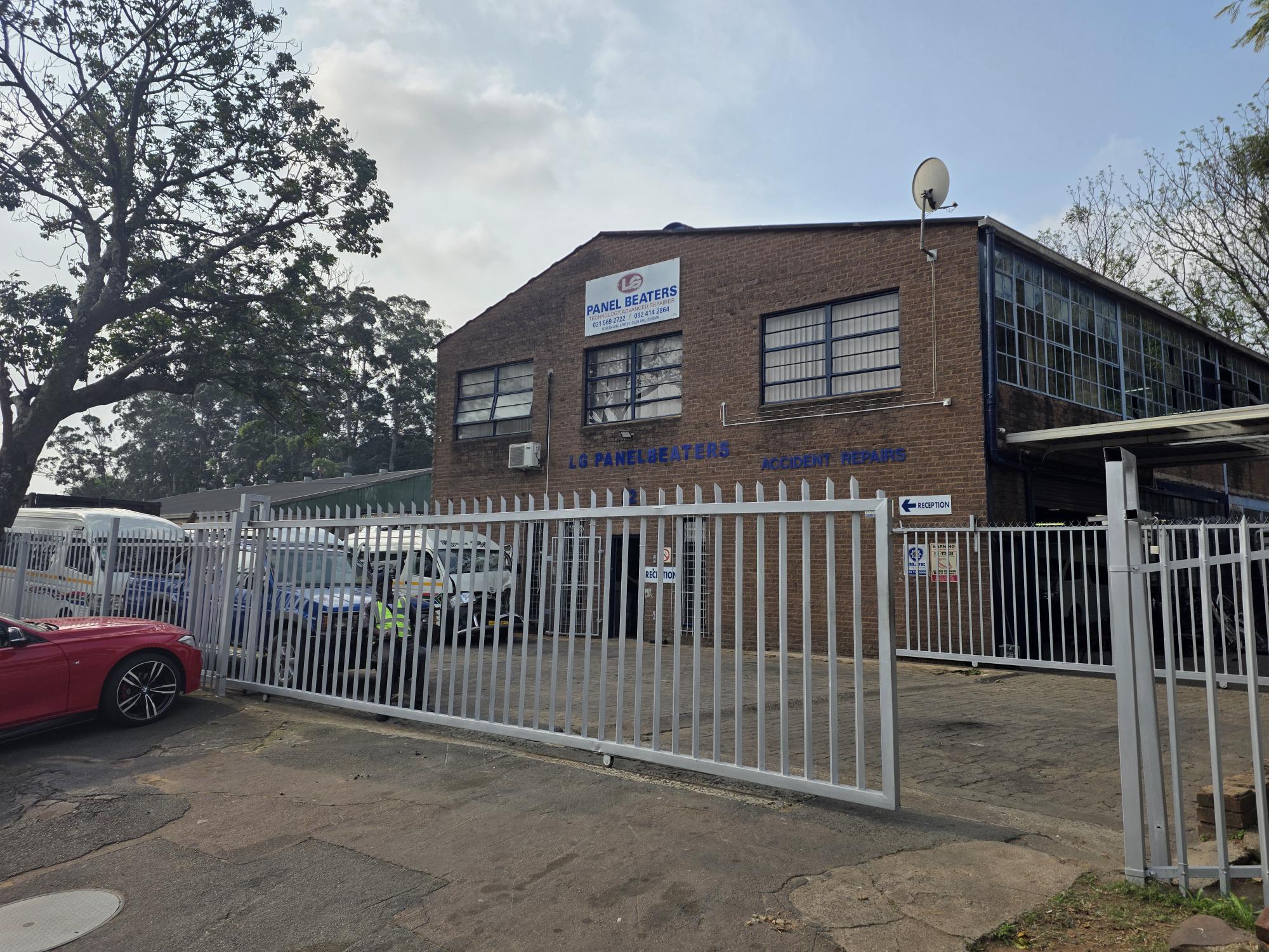 Exterior view of the LG Panel Beaters state-of-the-art repair workshop facility